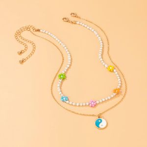 Collares colgantes Boho Perla Beads Flower colorida Collar de gargantilla corta para mujeres Tai chi colgantes 2021 joyería