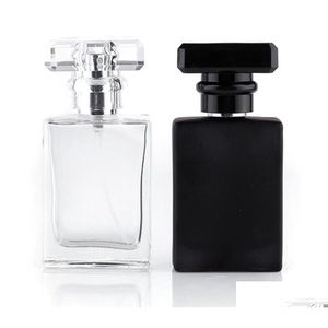 Bouteille de parfum en gros 30 ml / 1 oz. Noir clair par bouteilles d'atomiseur en verre carrées portables vides avec applicateur de pulvérisation Drop Delive Dhwfs