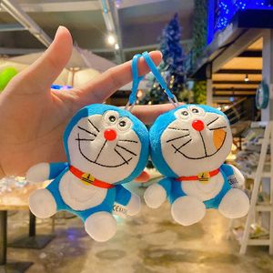 Peluche Jingle Cat Doraemon lindo bolso adornos dibujos animados pareja muñeca escuela adornos muñeca joyería llavero G1019