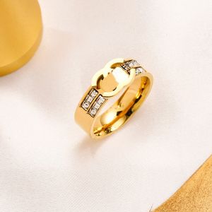 Marca de moda popular Anillo Diseñador Diseños de anillos de boda Amor para mujeres Anillo chapado en oro de 18 k Accesorios de joyería de lujo de acero inoxidable Pareja Familia con caja