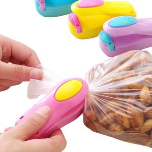 Práctico Mini máquina de sellado Herramientas de cocina Clip de alimentos portátil Máquinas de sellado térmico Sellador Accesorios de cocina para el hogar y Gadgets FY2670 C1110