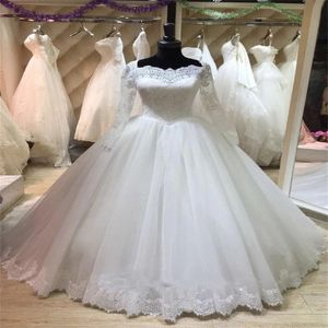 Abito da sposa principessa in pizzo illusione Abito da ballo a maniche lunghe Abito da sposa stile country Appliques Corsetto Sweep Train Abito da sposa in tulle Farm Robe De Mariage 2024