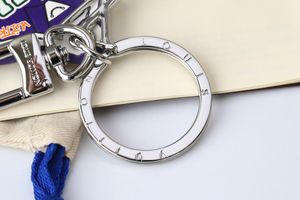 Veste violette porte-clés sac pendentif dessin animé grenouille lettre de conception