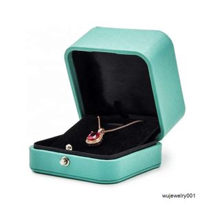 Pousser pour ouvrir la serrure verte boîtes à bijoux en cuir PU pendentif collier emballage petite boîte à bijoux vert