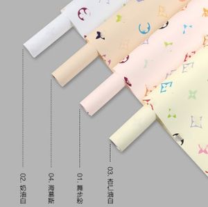 Qixi nouveau papier Hera coloré imperméable à l'eau papier Ouya boîte-cadeau florale cadeau fleur papier d'emballage haut tout-match