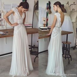 Robes de mariée modestes Boho 2019 manches courtes col en V dos ouvert jupe plissée dentelle mousseline de soie élégante une ligne robes de mariée de plage