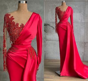 Vestidos formales de noche de sirena de manga larga roja 2022 con cuentas de encaje con borlas cuello redondo árabe Aso Ebi ocasión vestidos de graduación