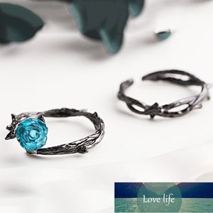 Anillos de pareja creativos Retro Color negro flores rosas diseño de espinas anillo de dedo cristal azul anillos abiertos Vintage