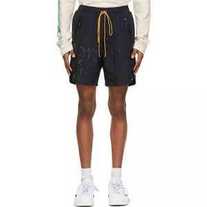 Short de créateur de marque de mode Rhude Dark Pattern Capris Summer Solid Color Mesh Inner Quick Dry Shorts pour hommes et femmes Tendance