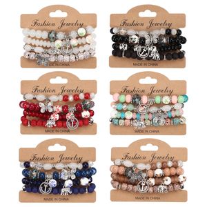 S2864 Joyería de moda bohemia Colgante de elefante Mariposa Elefante Ancla Hebras Pulsera con cuentas Hecha a mano Multicapa Cuentas coloridas Conjunto de pulseras con dijes