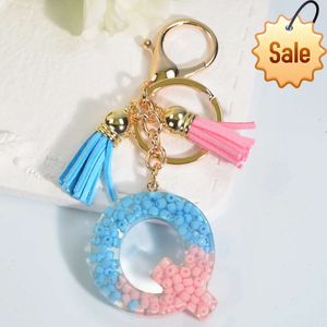 LLavero de cuentas de semillas con letras, abalorio de moda, llavero de coche alternativo rosa y azul, accesorios exquisitos con borlas, regalo Popular para mujer