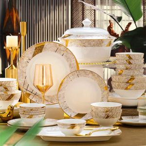 Définit la vaisselle de luxe en céramique artistique Golden Os China Dishes and Assiets Dinner Set 62pcs Nordic Table Volence