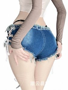 Mujeres sexy pantalones cortos de mezclilla caliente seductora uniforme de coqueteo con cordones borla hueco encuadernación pliegues cortos pantalones vaqueros de verano Temptati MUPY p9tk #