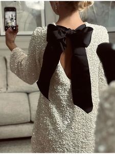 Brillant paillettes dos évider Bowknot Mini robe femmes à manches longues mince robes courtes femme vacances soirée fête Looks 240106