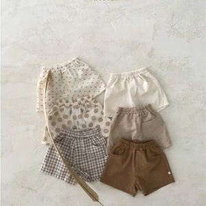 Shorts 3 Pocket Design Baby Boys Shorts Summer confortable Lavage Coton Préside préscolaire Shorts Soft Plain / Pantalage bébé en pointillé D240510