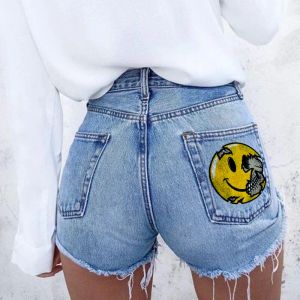 Shorts shorts féminins Streak Street Smiley Smiley Face Printing Shorts en jean, bord brut, pantalon chaud d'été, nouveau, en gros