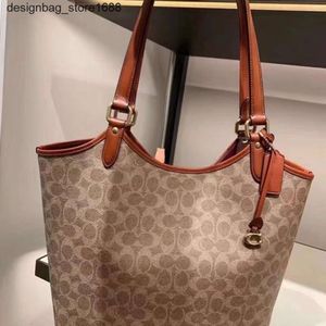 Diseñador de bolsas de hombro American Classic Style New Womens Bag Tote Gran capacidad One Crossbody Handbag Shopping