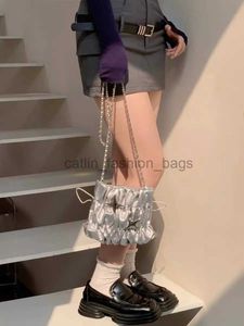 Bolsos de hombro 2023 Diseño de moda Sweet Cool Girl Silver Star Rod Cross Body Bag Edición simple para mujer Cartera de mujercatlin_fashion_bags