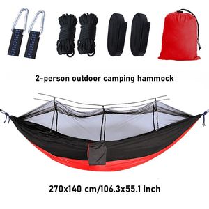 Camping Sleeping Double Hamacs Deux personnes STOCKS SWYLON SWYLON DE NYLON DE HAUTE QUALITÉ 200 kg Hamac Portable avec moustique net 240325