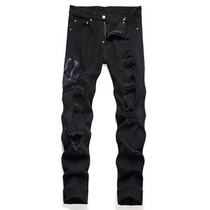 Broderie de serpent jean skinny masculin pantalon de jean extensible noir trous de streetwear droit mince en détresse en détresse