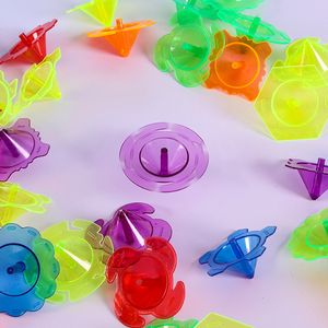Spinning Top 100pcs Mini Tops Intermitente Novedad Bulk Kids Spin Toys Party Favors Bundle Pack Colorido Plástico Giroscopios Juguete 230615
