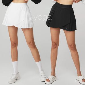 Jupes de tennis de golf sport avec shorts intégrés Femmes Couleur solide croix plissée mini jupe d'entraînement badminton