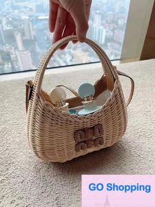 Spring and Summer Letter Rattan Handbag Straw Bag Seaside Vacation Style Women's Bag Small Clutch Tide