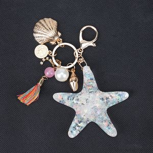 Porte-clés de voiture en forme d'étoile de mer, pour filles et femmes, accessoires de bijoux, pompon, coquille de conque, pendentif en perle, Animal de mer, porte-clés en métal