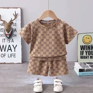 Stock 1 à 7 ans Designer Children Clothing Set T-shirt and Pants Set Brand Imprimé Enfants 2 pièces Pure Cotton Vêtements Baby Boys and Girls Fashion