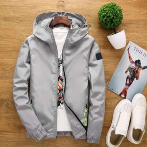 Chaqueta de piedra Gabardina de moda Versión coreana de primavera y otoño Parejas adolescentes Chaqueta reflectante Piedras con capucha Chaqueta para hombre Trend Stone 336