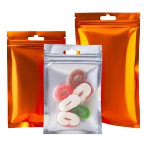 Sacs de rangement 100pcs en aluminium orange en aluminium transparent hang hole notch bonbons biscuit aliment snack réutilisable d'emballage sachets d'emballage