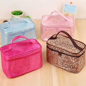 Sacs de rangement New Women's Letter Cosmetic Bag Fashion Quartet Travel Portable Storage Toilet Bag Cosmetic Storage Y2302