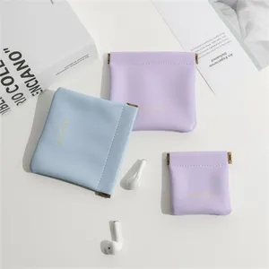 Bolsas de almacenamiento unisex PU cuero portátil monedero de monedas pequeñas organizador de auriculares auriculares mini lápices labiales cosméticos al por mayor