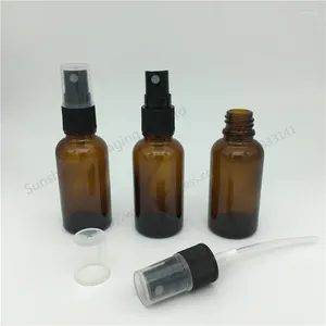 Bouteilles de rangement 10 pcs30 ml de bouteille en verre ambre avec lotion pulvérisateur à huile essentielle pulvérisation en gros
