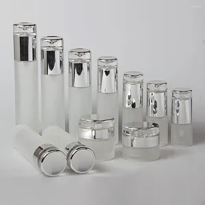 Bouteilles de rangement 100pcs / lots vide 40 ml mini bouteille cosmétique en verre pour lotion / parfum / crème pompe rechargeable en gros
