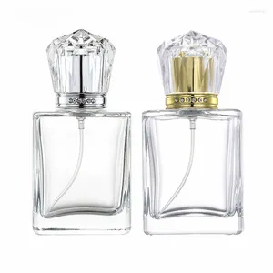 Botellas de almacenamiento 50 ml Botella de spray Corona Diamante Vidrio transparente Perfume Dispensación de oro Prensa de plata Embalaje vacío