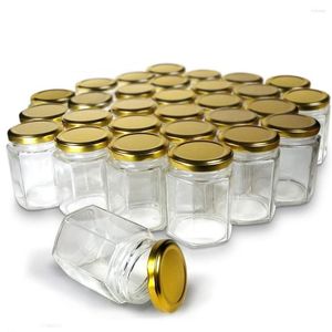 Bouteilles de stockage Bocaux en verre hexagonaux Premium de qualité alimentaire. Mini avec couvercles pour cadeaux, faveurs de mariage, confitures de miel, etc.