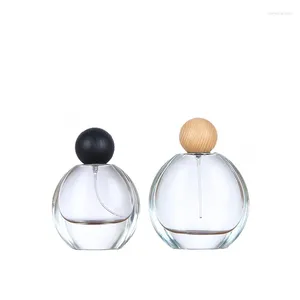 Bouteilles de stockage YUXI Crystal Blanc Matériel Plat Rond 50 ml Bouteille de parfum en verre transparent Vaporisateur portable avec baïonnette