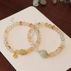 Conception de brin Jaune de haute qualité - Bracelet en cristal (citrine) décoré de jad et de mots chinois 