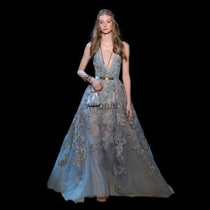 Robes de style de rue Robes élégantes Elie Saab Tenue de soirée Col plongeant Robe formelle en dentelle Illusion Corsage Longueur au sol Une ligne Robe de tapis rouge à paillettes HKD230912