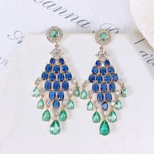 Boucles d'oreilles à tige avec pompon géométrique en Zircon coloré bicolore