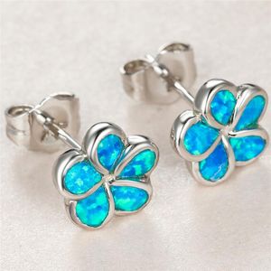 Pendientes de tuerca de lujo para mujer, abalorio de piedra de ópalo azul, Color plateado, pequeña flor delicada para novia, boda para mujer