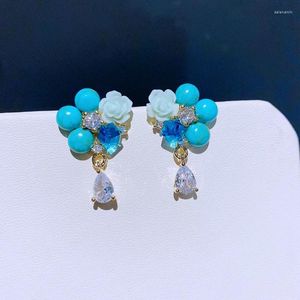 Boucles d'oreilles de goujon Fleur de résine en pierre turquoise de luxe pour femmes