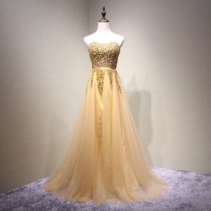 Impresionante vestido de noche dorado Vestidos de fiesta largos Sin tirantes con cordones en la espalda Lentejuelas con abalorios principales Vestidos de pasarela Fotos reales