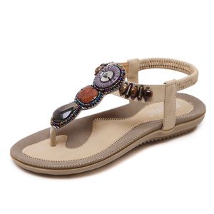 Été 2022 Sandales de style ethnique femelle Feme Travel Beach Bohemian rétro Retro Per perle chaussures plates chaussures