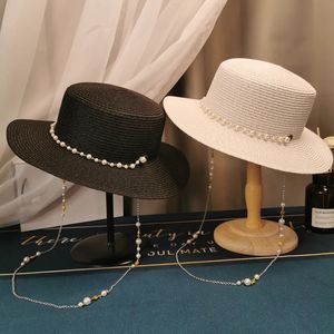 Summer Elegante cadena de perlas Flat Sun Hats for Women Chapeau Feminino Straw Sombrero Panamá ancho Antiuv Beach Cap Girl Topee240409