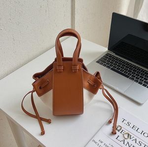 Bolsos de verano, bandolera de hombro a la moda, bolso de tendencia, bolso de lona con temperamento, bolsos de cubo con costuras creativas