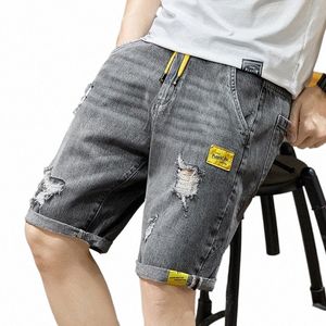 Pantalones cortos de mezclilla perforados grises de verano para hombres Pantalones cortos de mezclilla de cinco piezas elásticos delgados coreanos Pantalones de marca masculina 11 estilos g5xP #