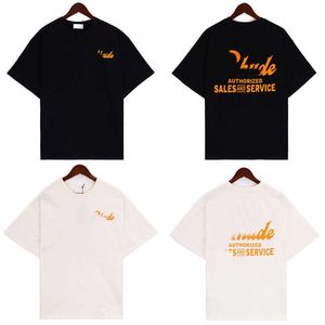 Nueva colección de verano con estampado de letras naranjas, camiseta sencilla y holgada de manga corta para hombre y mujer