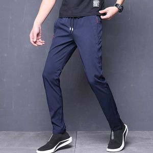 Pantalones de verano para hombre, ajustados, elásticos, coreanos, informales, ajustados, Chino, cintura elástica, Jogger, pantalones de vestir, negro, azul, X0615